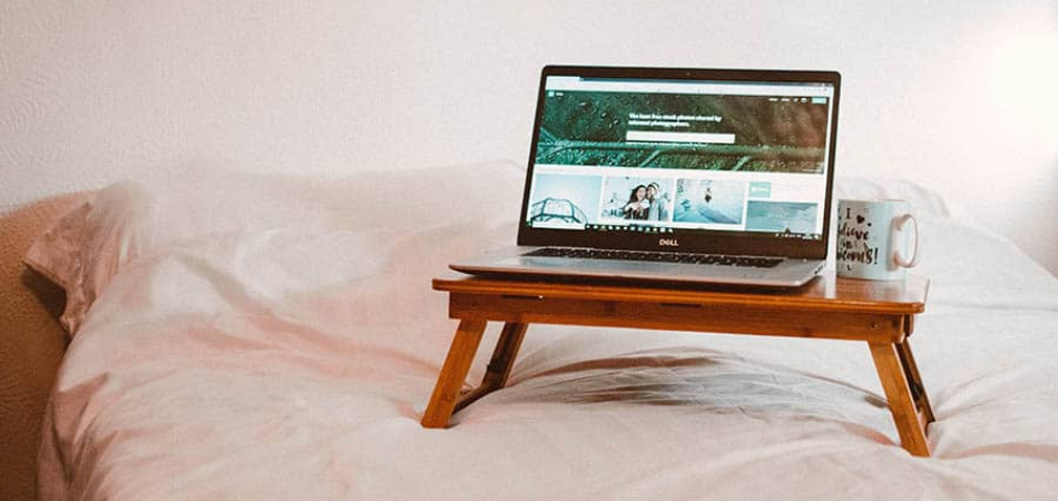 How To Use A Laptop In Bed Without Overheating